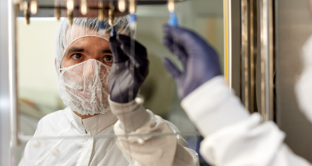 A TriSalus team member inspects the product in the lab.
